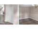 Hallway with a closet leading into a dining room and a living room with fireplace at 19 Indian Bluff Dr, Sharpsburg, GA 30277