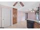 Traditional kitchen with light countertops, wood cabinets, and black appliances at 19 Indian Bluff Dr, Sharpsburg, GA 30277