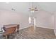 Bright living room featuring vaulted ceilings, fireplace, and hardwood floors at 19 Indian Bluff Dr, Sharpsburg, GA 30277