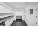 Finished basement with granite counters, tile flooring, and lots of storage cabinets at 5490 Chemin De Vie, Sandy Springs, GA 30342