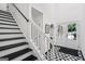 Welcoming entryway featuring tile floor and staircase at 5490 Chemin De Vie, Sandy Springs, GA 30342