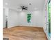 Well-lit bedroom featuring hardwood floors and an outdoor view at 1835 Taylor Ave, East Point, GA 30344