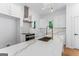 Well-appointed kitchen with quartz countertops, stainless steel appliances, and ample storage at 1835 Taylor Ave, East Point, GA 30344