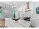 Modern kitchen featuring quartz island, stainless appliances, and pendant lighting at 1835 Taylor Ave, East Point, GA 30344