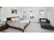 Spacious bedroom with multiple windows, a bed, and a sofa at 756 Cady Way, Atlanta, GA 30312