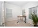 Bright office space with neutral walls, ample natural light, and a minimalist desk setup conducive to productivity and focus at 756 Cady Way, Atlanta, GA 30312
