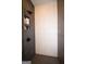 Modern shower featuring gray tiling, hexagon-shaped backsplash, and recessed shelving for toiletries at 756 Cady Way, Atlanta, GA 30312