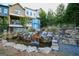 Beautiful water feature and landscaping on community grounds with surrounding townhome exteriors at 756 Cady Way, Atlanta, GA 30312