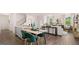 Contemporary living space with dining area, kitchen, and a comfortable living room at 580 Silver Moon Dr, Loganville, GA 30052