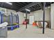 Unfinished basement area with a trampoline, and ample space at 109 Cannon Road, Sharpsburg, GA 30277