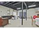Spacious basement area with a kitchenette and recreational space at 109 Cannon Road, Sharpsburg, GA 30277