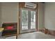 Basement access featuring a double door entryway and natural light at 109 Cannon Road, Sharpsburg, GA 30277