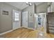 Bright foyer with hardwood floors and access to the staircase at 109 Cannon Road, Sharpsburg, GA 30277