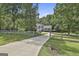 Charming two-story home with a quaint front porch and fenced yard at 109 Cannon Road, Sharpsburg, GA 30277