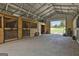 A clean horse barn with stalls, equipment, and an open end for pasture access at 109 Cannon Road, Sharpsburg, GA 30277