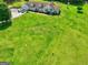 Large home boasts well-manicured lawn, a spacious driveway, and attractive landscaping at 260 Sams Dr, Fayetteville, GA 30214