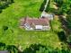 An aerial perspective showcases a home on a well-maintained lot with verdant grass at 260 Sams Dr, Fayetteville, GA 30214