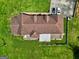 Aerial view displays a well-kept home, spacious grounds, and an inviting outdoor space at 260 Sams Dr, Fayetteville, GA 30214