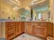 Bathroom with double sink vanity, large mirror, and recessed lighting at 260 Sams Dr, Fayetteville, GA 30214