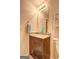 A modern bathroom vanity features granite countertops and dark wood cabinets at 260 Sams Dr, Fayetteville, GA 30214