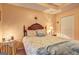 Neutral bedroom featuring a wood sleigh bed, a small dresser, and a comfortable, relaxing atmosphere at 260 Sams Dr, Fayetteville, GA 30214