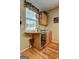 Custom bar area featuring granite countertops, wine fridge, cabinets and a window at 260 Sams Dr, Fayetteville, GA 30214