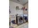 Laundry room features modern washer, dryer and a wash sink for added convenience at 260 Sams Dr, Fayetteville, GA 30214