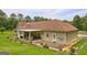 View of the back exterior of the home highlighting the patio and backyard space at 260 Sams Dr, Fayetteville, GA 30214