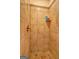 A walk-in shower is tiled in earth tones at 260 Sams Dr, Fayetteville, GA 30214