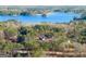 Scenic aerial view of a sprawling property, showcasing the home's location near the lake at 3735 Tamiami Trl, Cumming, GA 30041