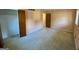 Comfortable bedroom with carpet, natural light, and a door to the hallway at 102 Crystal River Dr, Riverdale, GA 30274
