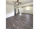 Spacious finished basement with modern flooring, neutral walls, and natural light at 7340 Chalk Way, Riverdale, GA 30296