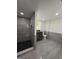 Modern bathroom with tiled walk-in shower and stylish vanity at 7340 Chalk Way, Riverdale, GA 30296