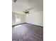 Spacious bedroom with neutral walls, plush carpet, and natural light from one window at 7340 Chalk Way, Riverdale, GA 30296