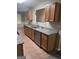 Well-lit kitchen features stainless steel appliances, ample counter space, and wooden cabinets at 2754 Vining Ridge Terrace, Decatur, GA 30034