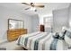 Cozy bedroom featuring carpeted floors, natural light, and neutral-toned walls at 315 Antebellum Way, Fayetteville, GA 30215