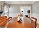 Charming dining room with hardwood floors, table, and natural light offering a cozy space for meals at 315 Antebellum Way, Fayetteville, GA 30215