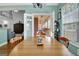 Dining room with wood table, view to outdoor porch at 315 Antebellum Way, Fayetteville, GA 30215