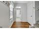 Hallway view with view to laundry room and stairs at 315 Antebellum Way, Fayetteville, GA 30215