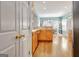 A view from the doorway showing the light filled eat-in kitchen and modern stainless steel appliances at 315 Antebellum Way, Fayetteville, GA 30215