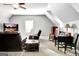 Cozy living room with neutral paint colors, a ceiling fan, carpet floors and two reclining chairs at 315 Antebellum Way, Fayetteville, GA 30215