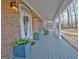 Charming porch featuring rocking chairs and decorative plants creating a cozy outdoor space at 315 Antebellum Way, Fayetteville, GA 30215