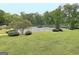 A community tennis court surrounded by landscaped greenery, providing a recreational amenity at 315 Antebellum Way, Fayetteville, GA 30215