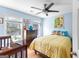 Well-decorated bedroom with hardwood floors, a crib, and a dresser at 255 Hidden Lake Dr, Fayetteville, GA 30215