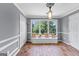 Bonus room features natural light and custom window seats overlooking a manicured yard at 255 Hidden Lake Dr, Fayetteville, GA 30215
