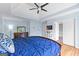 Bright main bedroom boasts trey ceilings, an ensuite bathroom, and a walk-in closet at 255 Hidden Lake Dr, Fayetteville, GA 30215