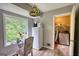 Corner kitchen nook featuring a table, chairs, and view to a laundry room at 1638 River Trc, Auburn, GA 30011