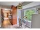 Bright kitchen nook with a view of the backyard through a large window at 1638 River Trc, Auburn, GA 30011