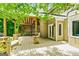 Relaxing back deck with covered area, white railings, and entry doors at 324 Chimney Sweep Cir, Peachtree City, GA 30269