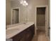 Bathroom featuring double vanity with a view of the water closet at 1946 Jeffery Nw Rd, Atlanta, GA 30318